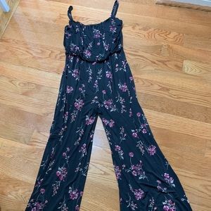 NWT One piece floral jumpsuit. Medium